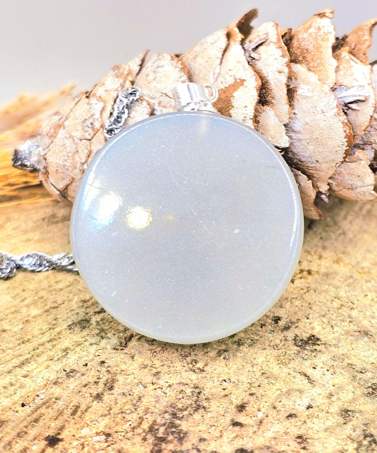 Stone carved cat face pendant in labradorite or moonstone with round crystal design — My Aura Gemstones