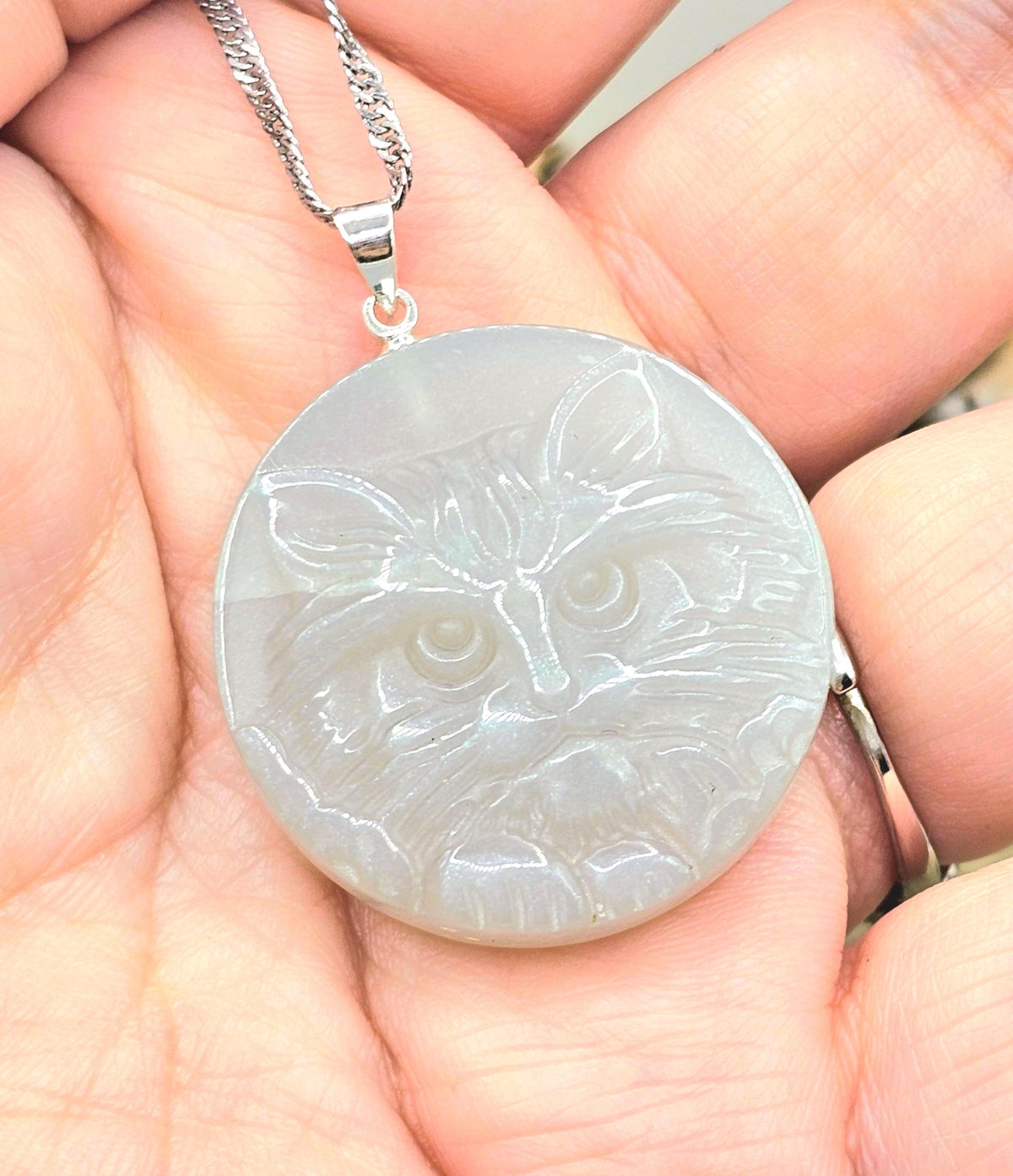 Stone carved cat face pendant in labradorite or moonstone with round crystal design — My Aura Gemstones