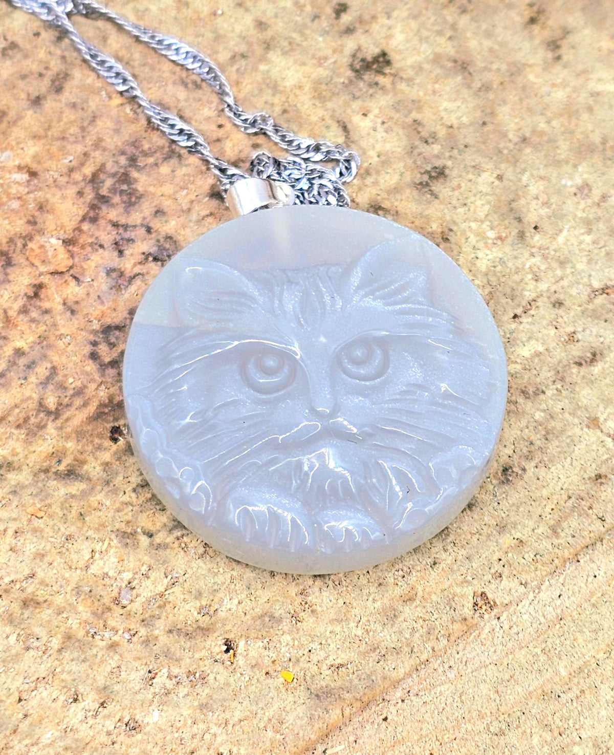 Stone carved cat face pendant in labradorite or moonstone with round crystal design — My Aura Gemstones