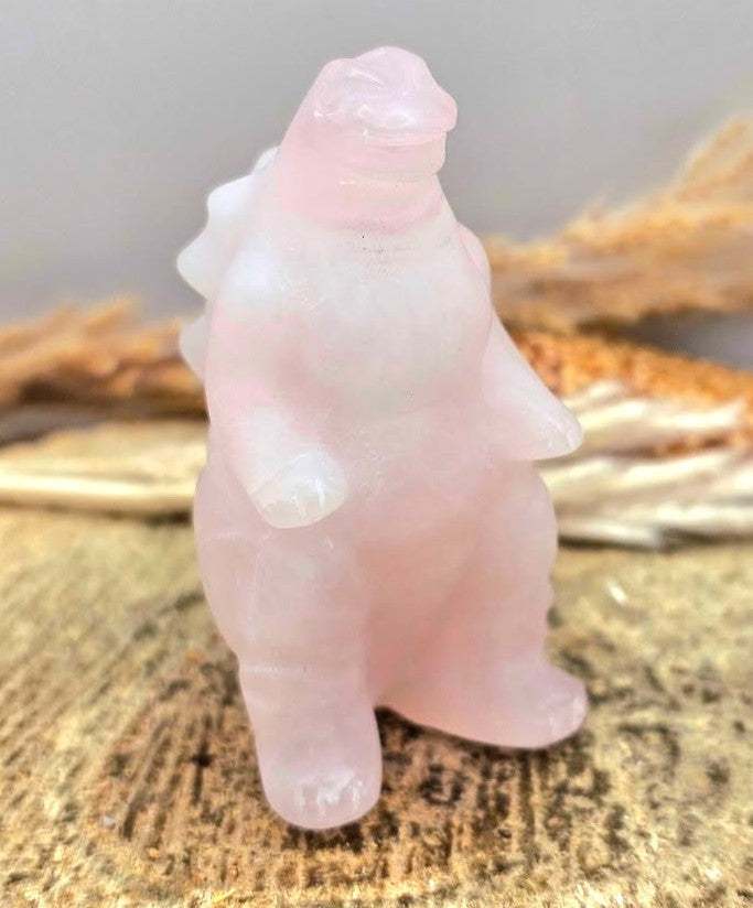 Rose quartz gorilla‑inspired figurine, light pink carving with detailed body, spine, and tail, 2.4" crystal sculpture-My Aura Gemstones